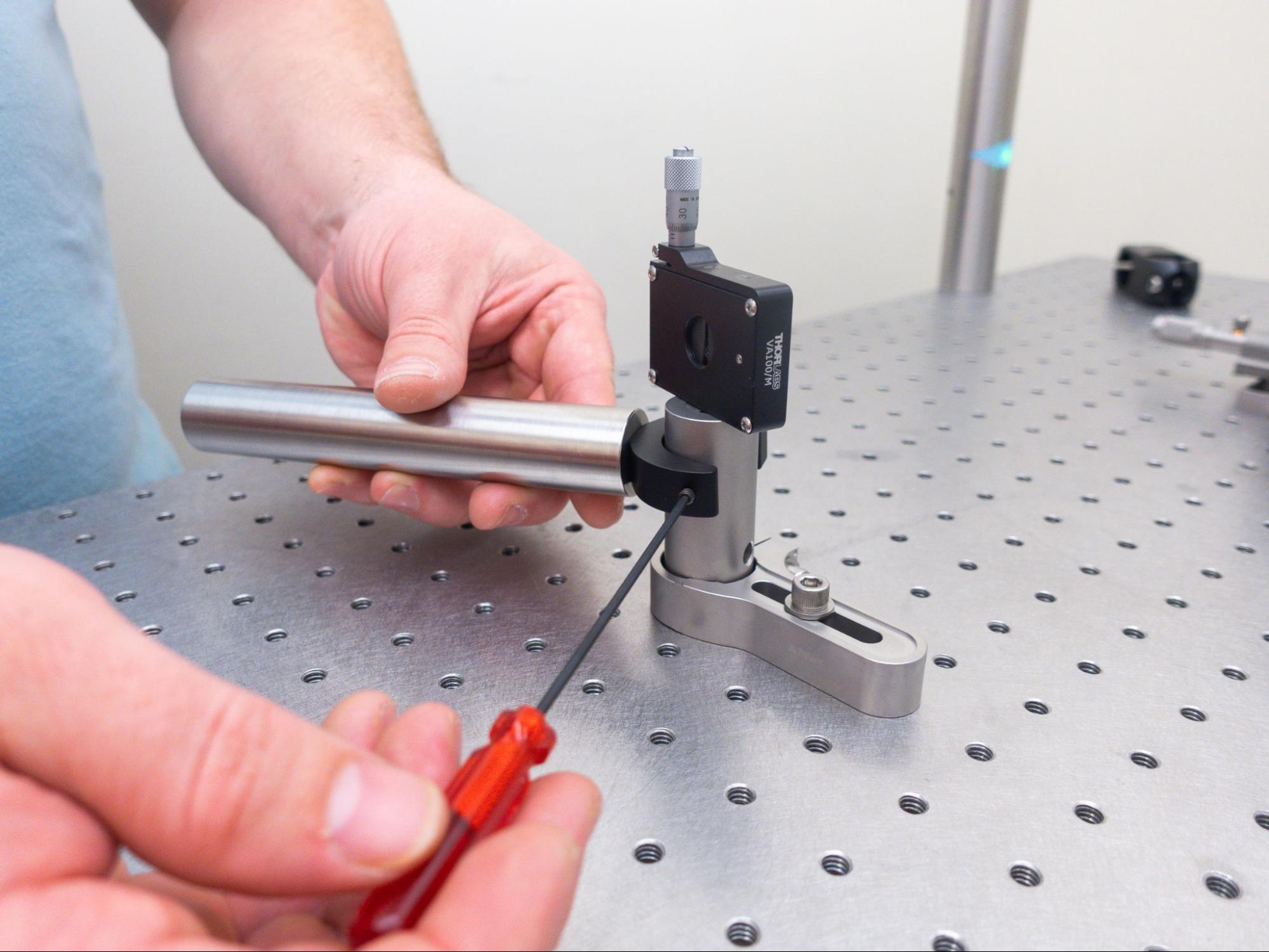 Attaching a Thorlabs RM1A_M clamp to a post