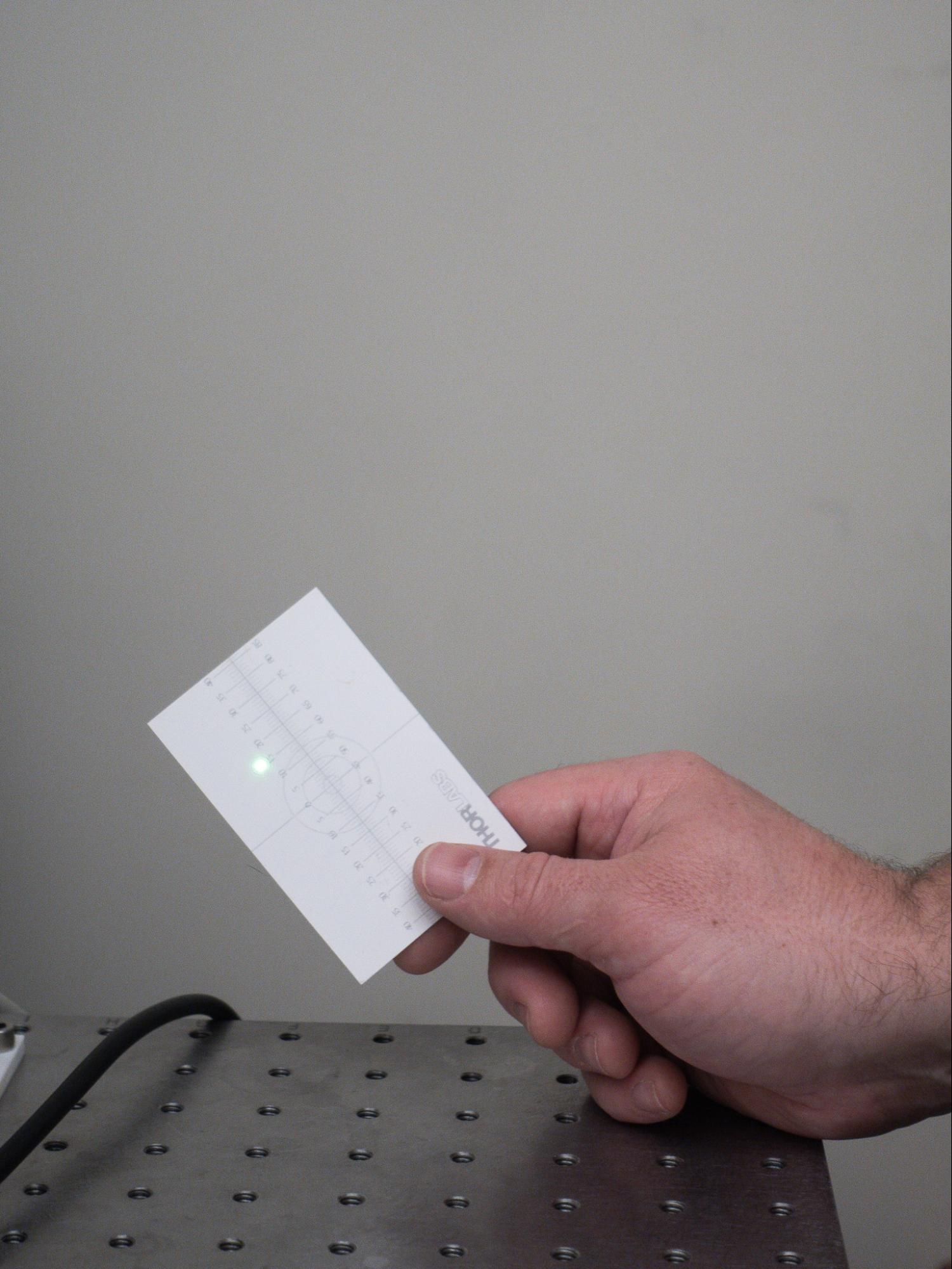 A laser spot on a card